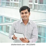 happy-bangladesh-business-man-holding-260nw-391133695 happy-bangladesh-business-man-holding-260nw-391133695